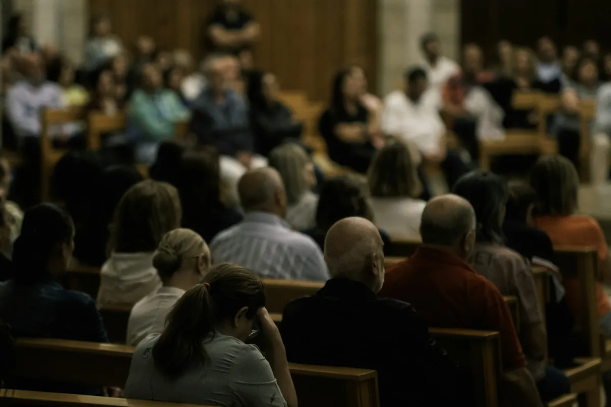 A congregation seated in the pews during a Sunday service.